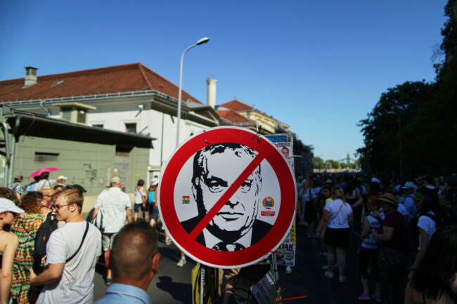 participants-in-the-pride-march-walk-by-a-depiction-of-hungarian-prime-minister-viktor-orban-in-budapest-hungary-saturday-june-28-2025-ap-photorudolf-karancsi