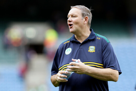robbie-brennan-inspects-the-pitch-before-the-game