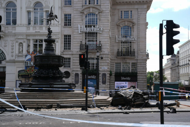 the-scene-after-a-car-crashed-near-the-shaftesbury-memorial-fountain-popularly-known-as-eros-in-londons-piccadilly-circus-emergency-services-were-called-to-reports-of-a-road-traffic-collision-at-ar