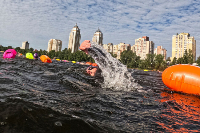 war-amputee-veteran-oleksandr-dashko-swims-in-the-dnipro-river-during-the-oceanman-kyiv-a-5-km-swim-race-in-kyiv-ukraine-on-sunday-june-29-2025-ap-photoevgeniy-maloletka