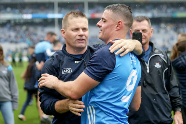 brian-howard-and-manager-dessie-farrell-celebrate-winning-after-the-game