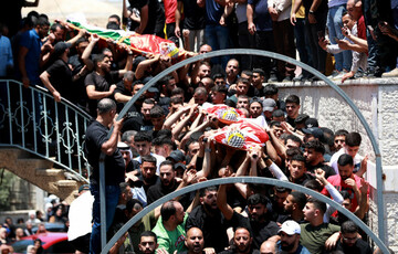 ramallah-west-bank-26th-june-2025-people-carry-the-bodies-of-three-palestinians-killed-in-an-israeli-settler-attack-in-the-town-of-kafr-malik-east-of-ramallah-central-west-bank-on-june-26-2025