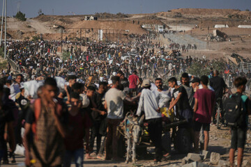palestinians-carry-humanitarian-aid-packages-near-the-gaza-humanitarian-foundation-distribution-center-operated-by-the-u-s-backed-organization-in-khan-younis-southern-gaza-strip-thursday-june-26