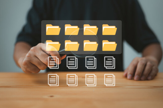 yellowfoldersdocumentsmediacontentdisplayedonmonitor-officeclerks