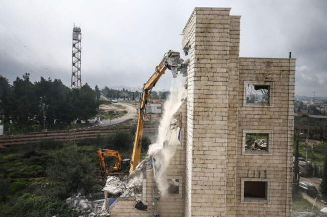 israeli-military-excavator-demolishs-the-house-of-the-palestinian-abu-zahriah-family-which-was-reportedly-built-without-a-construction-permit-in-the-beit-hanina-neighborhood-of-israeli-annexed-eas