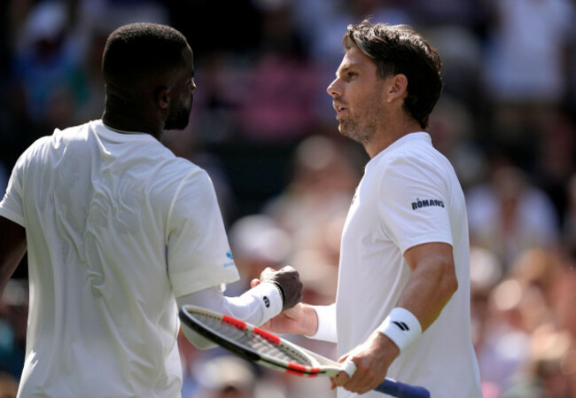 winner-cameron-norrie-right-shakes-hands-with-frances-tiafoe-after-their-match-on-day-three-of-the-2025-wimbledon-championships-at-the-all-england-lawn-tennis-and-croquet-club-london-picture-date
