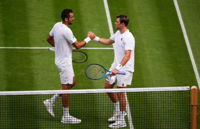 jack-draper-right-following-his-defeat-to-marin-cilic-on-day-four-of-the-2025-wimbledon-championships-at-the-all-england-lawn-tennis-and-croquet-club-london-picture-date-thursday-july-3-2025