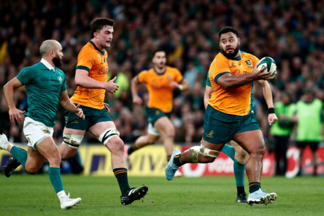 australias-taniela-tupou-right-runs-with-the-ball-during-the-autumn-nations-series-rugby-union-match-between-ireland-and-australia-at-aviva-stadium-dublin-ireland-saturday-nov-30-2024-ap-p