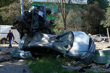 damaged-cars-lie-in-a-yard-among-other-debris-after-a-russian-drone-and-missile-attacks-in-kyiv-ukraine-friday-july-4-2025-ap-photoefrem-lukatsky