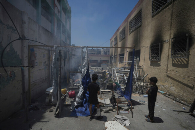palestinians-children-look-at-the-destruction-at-a-school-used-as-a-shelter-after-it-was-struck-by-an-israeli-airstrike-in-gaza-city-on-thursday-july-3-2025-ap-photojehad-alshrafi