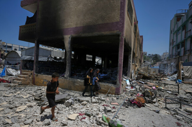 palestinians-survey-the-destruction-at-a-school-used-as-a-shelter-after-it-was-struck-by-an-israeli-airstrike-in-gaza-city-on-thursday-july-3-2025-ap-photojehad-alshrafi