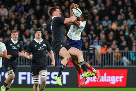 jordie-barrett-of-new-zealand-and-theo-attissogbe-right-of-france-compete-for-the-ball-during-their-rugby-test-against-france-in-dunedin-new-zealand-saturday-july-5-2025-marty-melvillephotosp