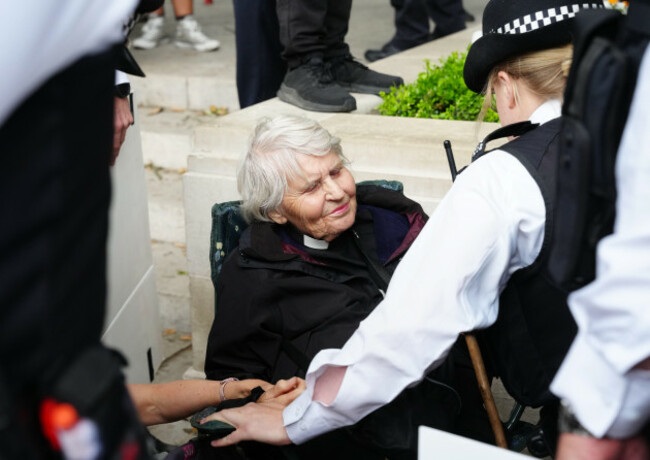 metropolitan-police-officers-speak-to-83-year-old-reverend-sue-parfitt-during-a-protest-in-support-of-palestine-action-organised-by-the-defend-our-juries-group-in-front-of-the-mahatma-gandhii-statue