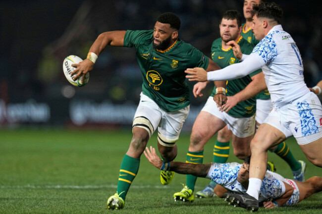 south-africas-vincent-tshituka-left-passes-the-ball-during-a-rugby-championship-test-match-between-south-africa-and-italy-at-loftus-versfeld-stadium-in-pretoria-south-africa-saturday-july-5-20