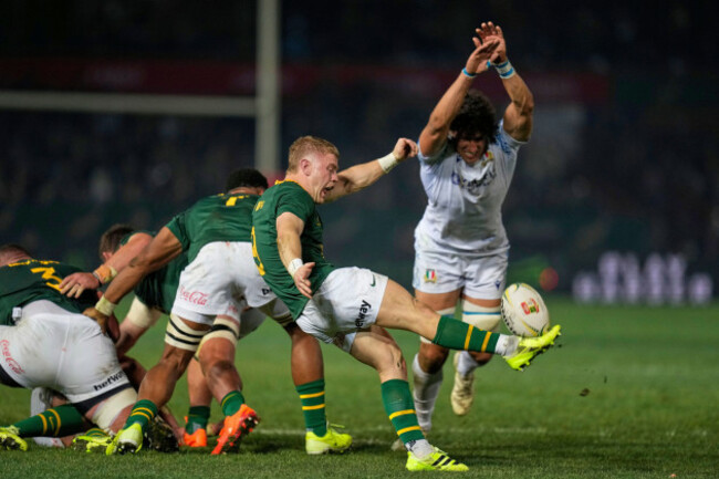 south-africas-morne-van-den-berg-centre-kicks-the-ball-as-italys-andrea-zambonin-tries-to-block-the-ball-during-a-rugby-championship-test-match-between-south-africa-and-italy-at-loftus-versfeld-s