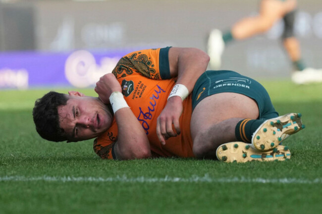 australias-noah-lolesio-lays-on-the-ground-injured-during-their-rugby-union-international-match-against-fiji-in-newcastle-australia-sunday-july-6-2025-ap-photomark-baker