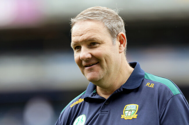 robbie-brennan-inspects-the-pitch-before-the-game