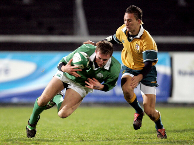 tommy-odonnell-gets-tackled-by-quade-cooper-21122005