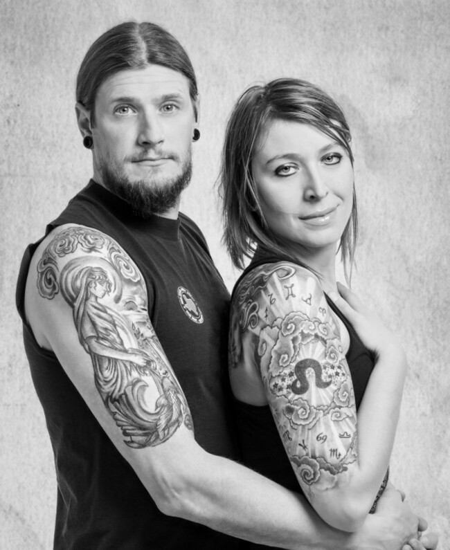 black-white-studio-portrait-of-man-and-woman-with-tattoos