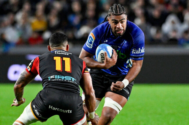 hoskins-sotutu-of-the-blues-runs-at-the-defense-during-the-super-rugby-final-between-the-chiefs-and-the-blues-in-auckland-new-zealand-saturday-june-22-2024-andrew-cornagaphotosport-via-ap