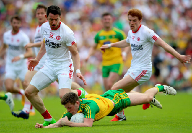 mattie-donnelly-and-peter-harte-tackle-eoghan-ban-gallagher