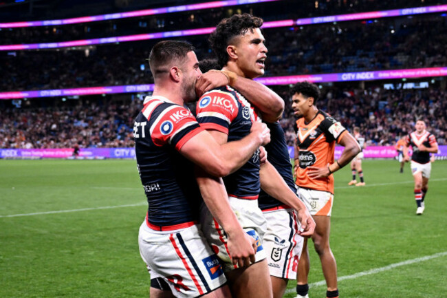 sydney-australia-26th-aug-2023-joseph-aukuso-suaalii-of-the-roosters-centre-celebrates-after-scoring-a-try-during-the-round-26-nrl-match-between-the-sydney-roosters-and-the-wests-tigers-at-allia