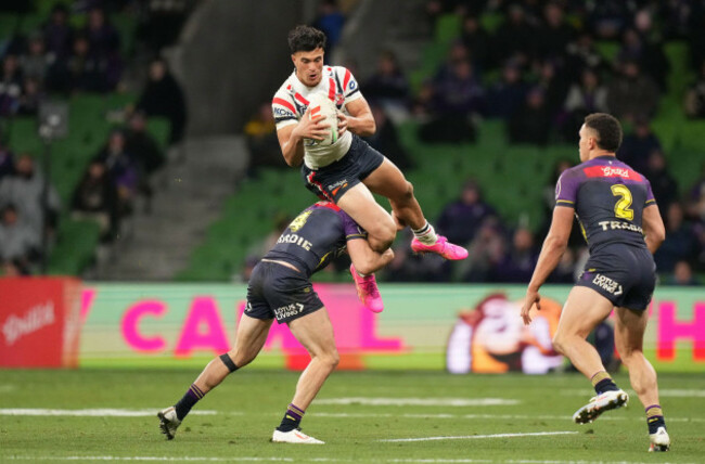 melbourne-australia-20th-july-2024-joseph-aukuso-suaalii-of-the-roosters-is-tackled-by-nick-meaney-of-the-melbourne-storm-during-the-nrl-round-20-match-between-the-melbourne-storm-and-the-sydney