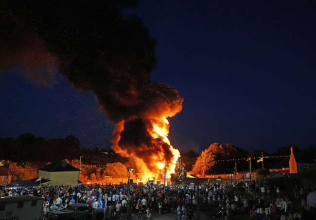 effigies-of-migrants-in-a-boat-burn-atop-a-bonfire-at-moygashel-co-tyrone-ahead-of-events-to-mark-the-twelfth-of-july-picture-date-thursday-july-10-2025