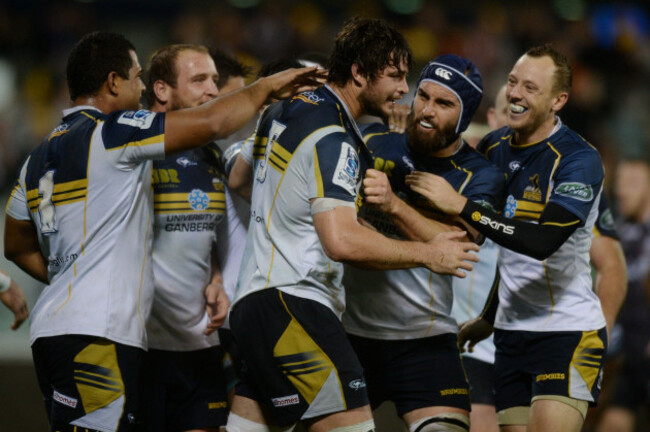 act-brumbies-sam-carter-celebrates-with-team-mates-after-scoring-a-try-during-the-round-13-super-rugby-match-between-the-brumbies-and-the-sharks-at-gio-stadium-in-canberra-saturday-may-10-2014-a