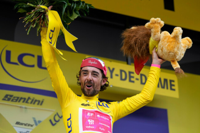 new-overall-leader-irelands-ben-healy-celebrates-on-the-podium-after-the-tenth-stage-of-the-tour-de-france-cycling-race-over-165-3-kilometers-102-7-miles-with-start-in-ennezat-and-finish-in-le-mont