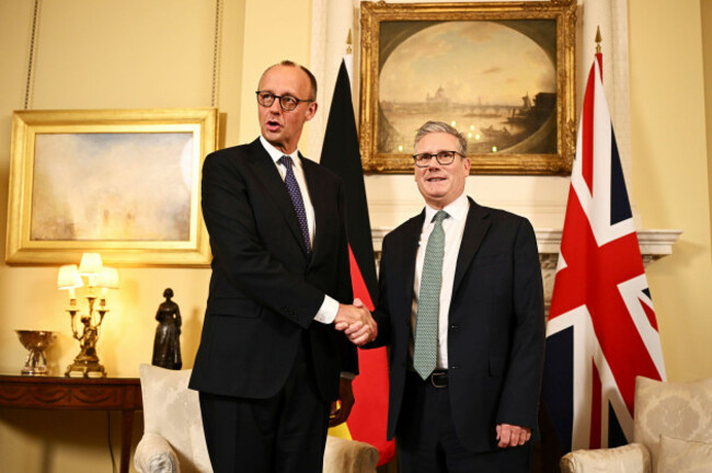 german-chancellor-friedrich-merz-left-and-britains-prime-minister-keir-starmer-shake-hands-ahead-of-their-meeting-at-10-downing-street-in-london-thursday-july-17-2025-leon-neal-pool-photo-via