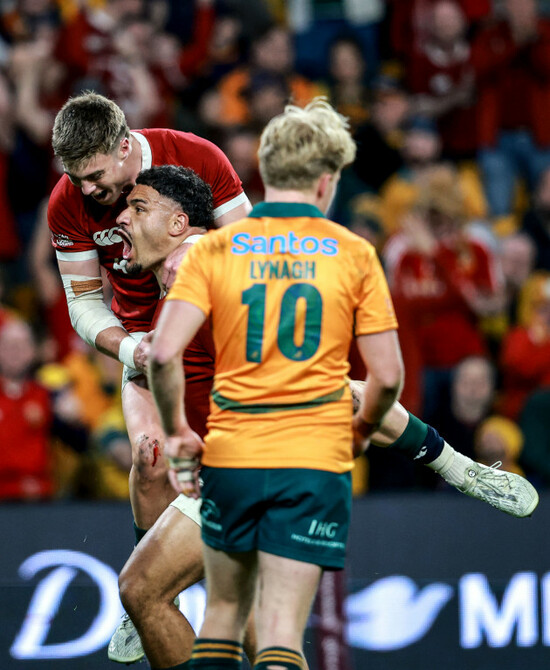sione-tuipulotu-celebrates-scoring-his-sides-first-try-with-tommy-freeman