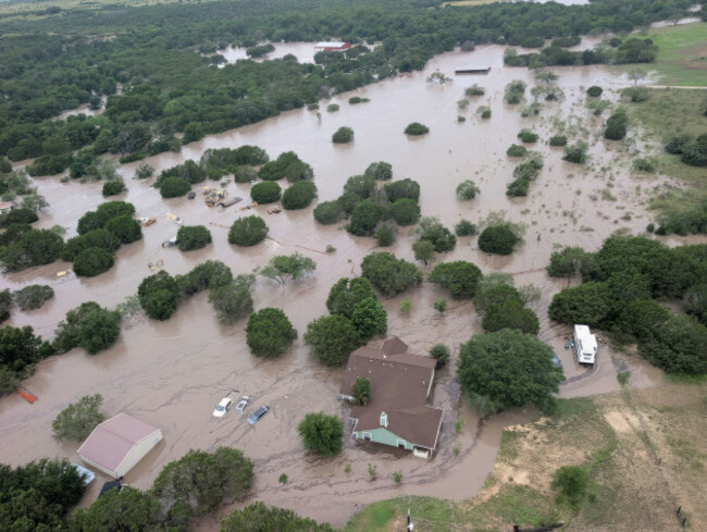 kerville-texas-united-states-of-america-05-july-2025-aerial-view-from-a-coast-guard-search-and-rescue-helicopter-of-the-guadalupe-river-flooding-the-surrounding-area-july-5-2025-near-kerville