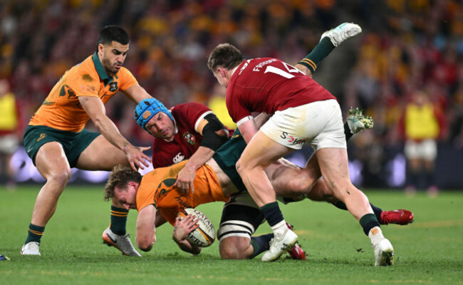 brisbane-australia-19th-july-2025-harry-potter-of-the-wallabies-is-tackled-by-tadhg-beirne-left-and-tommy-freeman-of-the-lions-during-the-first-test-match-between-the-wallabies-and-the-british-a