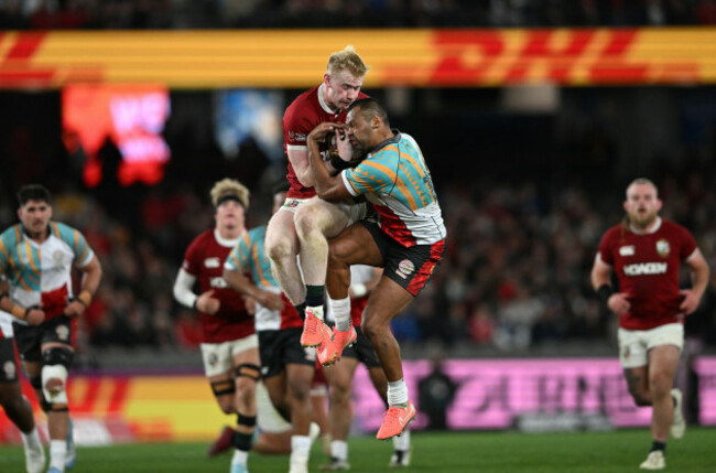 melbourne-australia-22nd-july-2025-jamie-osborne-of-the-lions-competes-for-the-ball-with-kurtley-beale-of-first-nations-pacifika-during-the-tour-match-between-the-first-nations-pasifika-xv-and