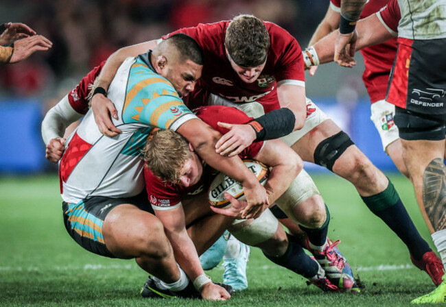 jac-morgan-is-tackled-by-lington-ieli