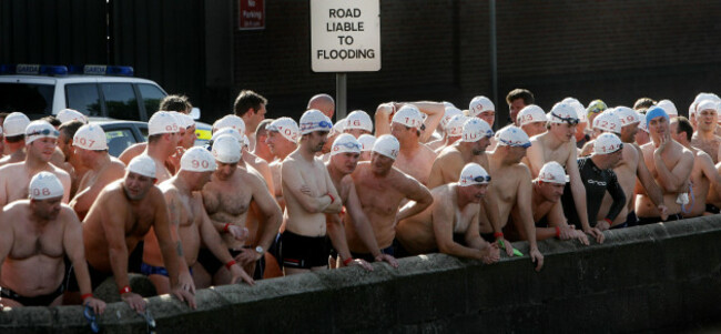 competitors-wait-on-the-quays-to-take-part-in-the-90th-annual-liffey-swim-through-dublin