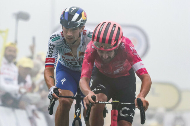 tour-de-france-2025-stage-14-pau-to-luchon-superbagneres-ben-healy-for-ef-education-easy-post-and-primoz-roglic-for-redbull-bora-hansgrhe-at-the-end-of-the-stage-credit-peter-godingalamy-live