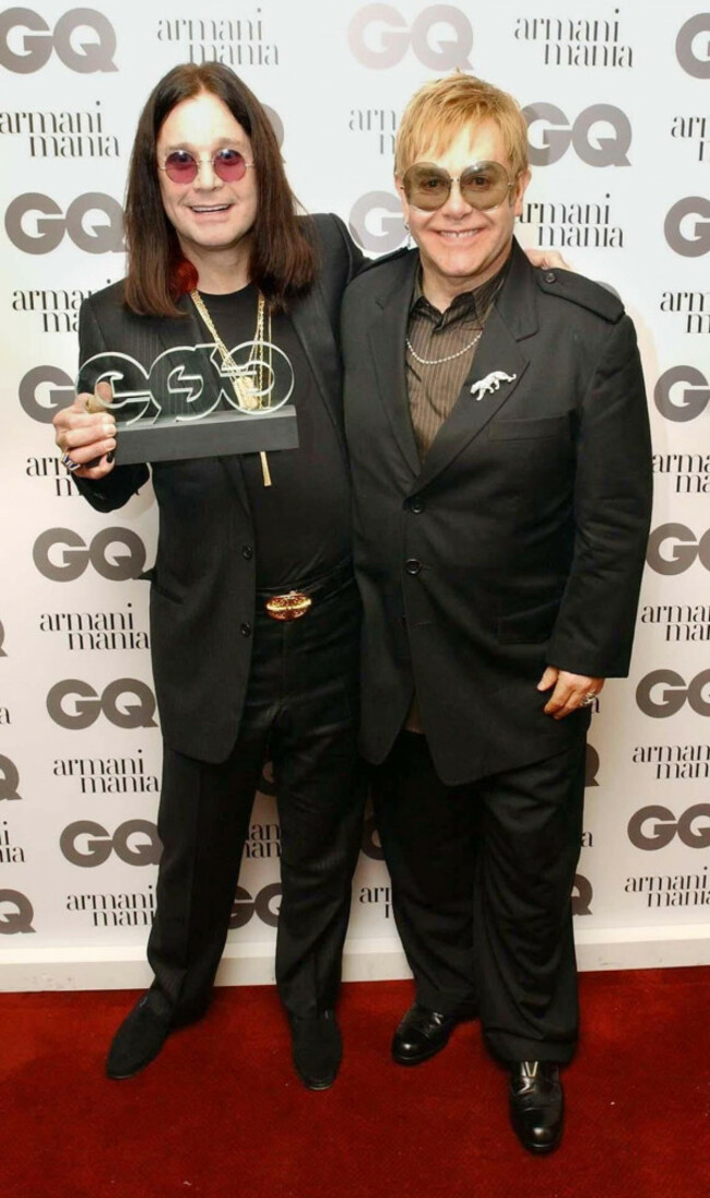 file-photo-dated-070904-of-singer-sir-elton-john-right-presents-ozzy-osbourne-with-the-editors-special-award-during-the-7th-annual-gq-men-of-the-year-awards-at-the-royal-opera-house-in-covent-gar