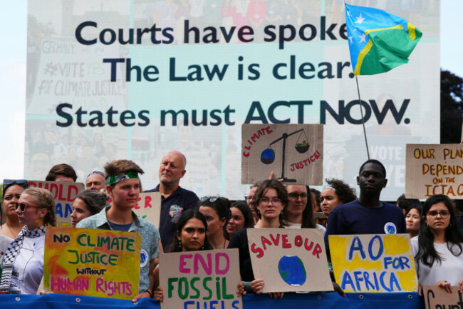 activists-demonstrate-outside-the-international-court-of-justice-ahead-of-an-advisory-opinion-on-what-legal-obligations-nations-have-to-address-climate-change-and-what-consequences-they-may-face-if-th