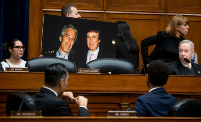 united-states-representative-jared-moskowitz-democrat-of-florida-holds-a-photo-board-featuring-a-photo-of-jeffrey-epstein-and-donald-trump-during-a-house-committee-on-oversight-and-accountability-m