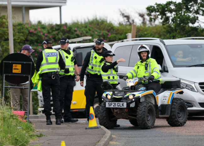 police-outside-the-perimeter-of-turnberry-golf-course-in-south-ayrshire-ahead-of-the-arrival-of-us-president-donald-trump-to-begin-his-five-day-private-trip-to-the-country-picture-date-friday-july