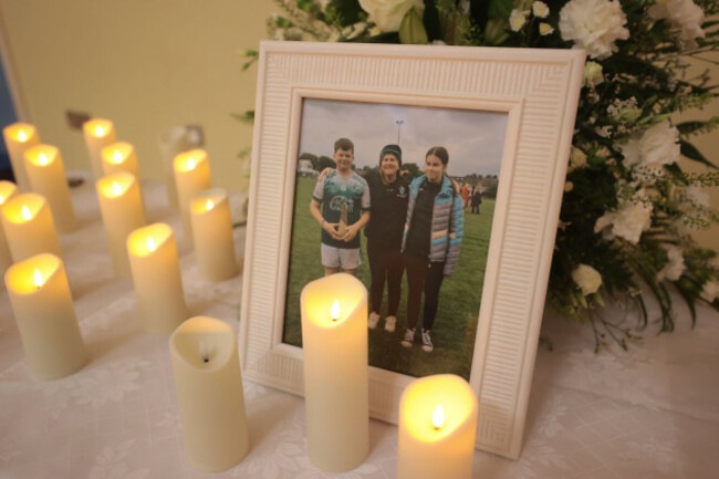 candles-surround-a-photograph-of-shooting-victims-vanessa-whyte-45-and-her-children-james-14-and-sara-13-during-a-vigil-at-maguiresbridge-primary-school-in-co-fermanagh-a-school-attended-by-ja