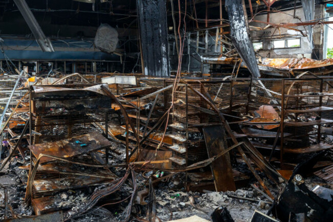 thailand-27th-july-2025-july-27-2025-kantharalak-sisaket-thailand-the-interior-of-a-gas-station-convenience-store-in-kanthalarak-thailand-stands-burned-and-bombed-out-as-a-result-of-a-cambodi