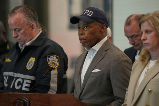 new-york-mayor-eric-adams-center-speaks-during-a-news-conference-at-new-york-presbyterian-weil-cornell-medical-center-where-a-police-officer-was-brought-after-being-shot-at-a-manhattan-office-buildi