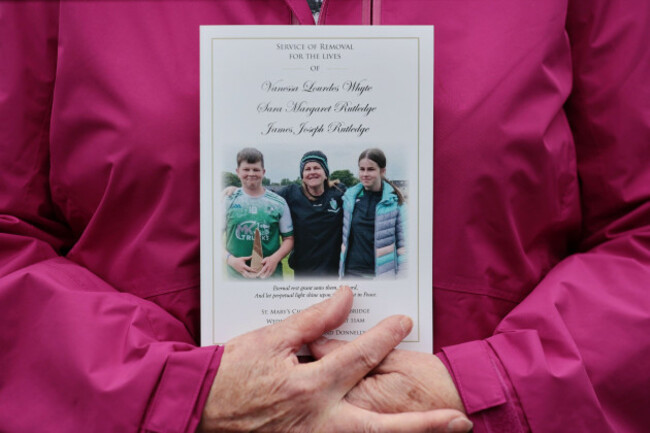 the-order-of-service-is-held-ahead-of-the-service-of-removal-for-vanessa-whyte-her-son-james-rutledge-and-daughter-sara-rutledge-at-st-marys-church-in-maguiresbridge-the-funeral-mass-will-be-held