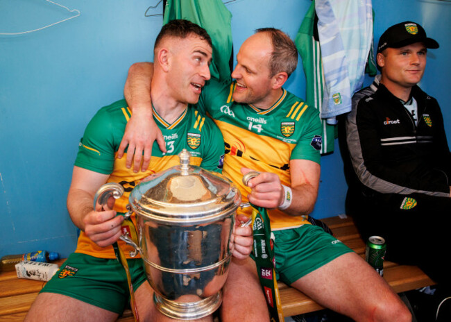 patrick-mcbrearty-and-michael-murphy-celebrate-in-the-dressing-room-with-the-ulster-gaa-senior-trophy
