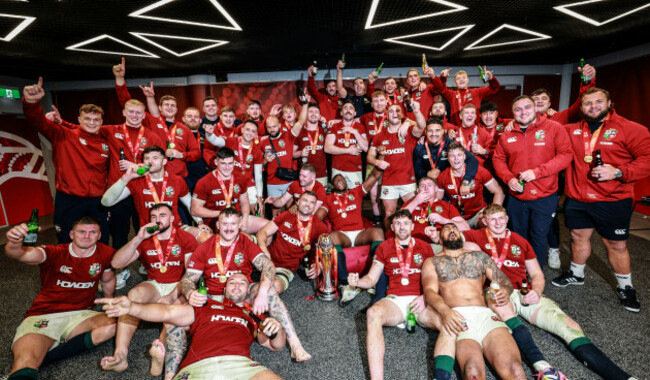 lions-players-celebrate-after-the-match-in-the-dressing-room-with-the-qatar-airways-series-trophy