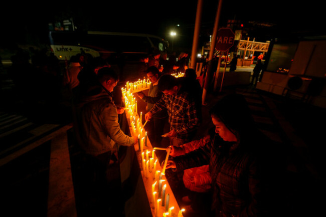 people-light-candles-during-a-vigil-in-front-of-el-teniente-copper-mine-operated-by-codelco-where-a-cave-in-killed-one-worker-and-trapped-five-others-underground-halting-operations-in-rancagua-chi