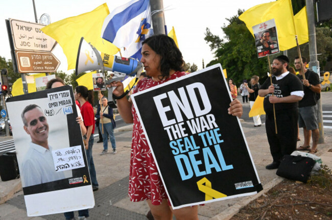 jerusalem-israel-05th-aug-2025-people-hold-placards-with-photos-of-israeli-hostages-held-in-gaza-during-a-protest-for-the-release-of-hostages-held-in-gaza-and-against-the-expansion-of-the-israel-h
